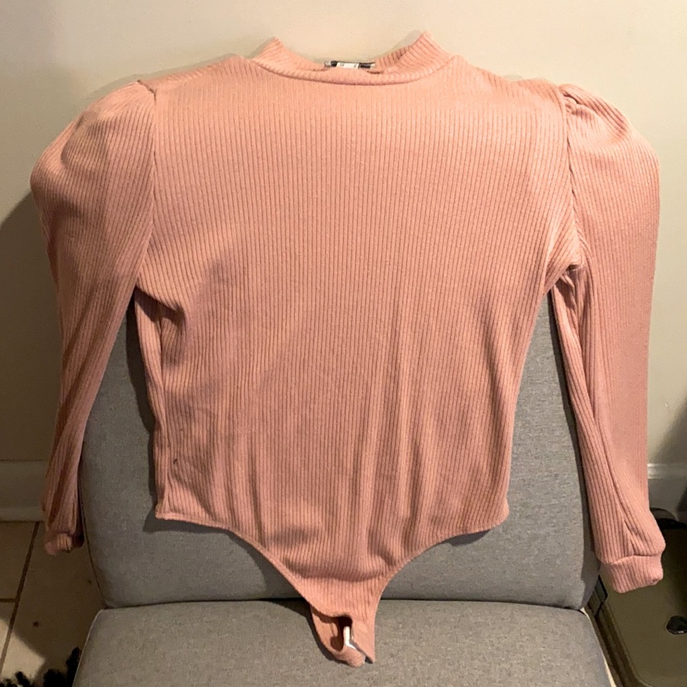 Dusty rose, long sleeve body suit. Can be dressed up or down. Size medium.